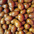 Œuf au chocolat au lait fourré de pâte à tartiner au cacao et aux noisettes. (100g)